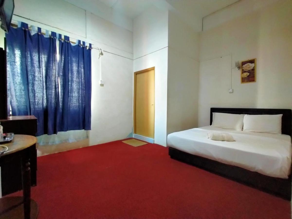 Spot On 89994 Rz Gold Hotel Kuala Kerai Bagian luar foto